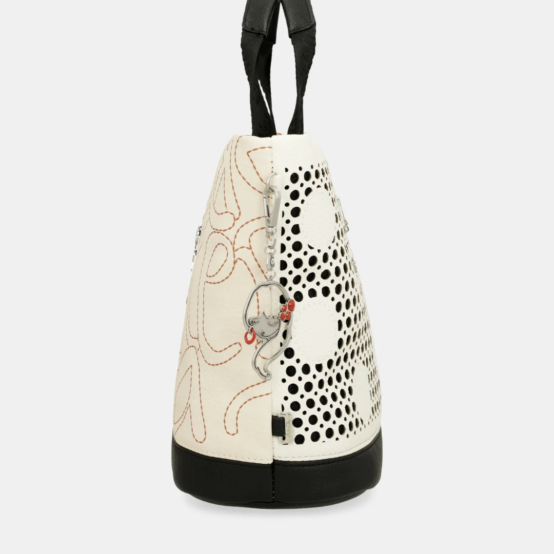 Esta carteira é o acessório perfeito para quem procura estilo, cor e personalidade. Inspirada na arte e na expressão criativa, o seu design combina tons terrosos e estampas vibrantes, tornando-a uma peça única e sofisticada.
Com um estampado vibrante, esta coleção é inspirada numa viagem pelo país natal de Anekke: Espanha.