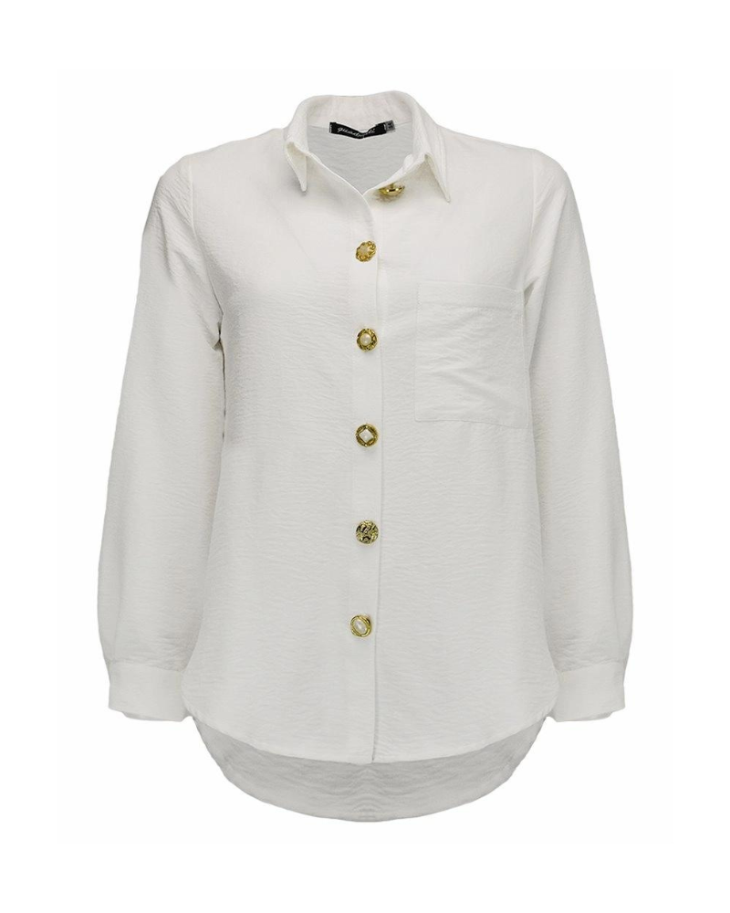 A camisa Esmeralda oferece elegância e conforto. Destaca-se pela singularidade dos botões diferentes, tornando-a uma escolha distinta para quem procura adicionar originalidade ao seu guarda-roupa. Esta camisa pode ser uma escolha elegante para várias ocasiões, proporcionando um toque personalizado e pode ser usada com saias, calças ou mesmo sob um blazer, dependendo do ambiente. Made in Portugal