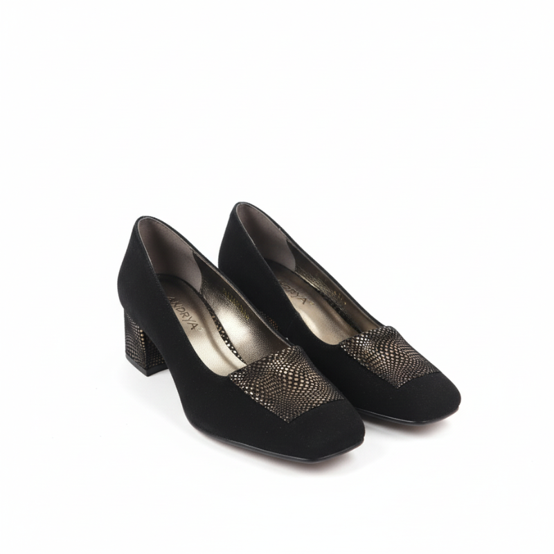 Descubra a elegância intemporal deste sapato de salto em camurça preta, uma peça essencial para a mulher sofisticada que valoriza o conforto sem comprometer o estilo.

Fabricado em camurça de alta qualidade, este modelo apresenta um acabamento luxuoso que complementa qualquer ocasião, desde o ambiente profissional até eventos noturnos especiais.
