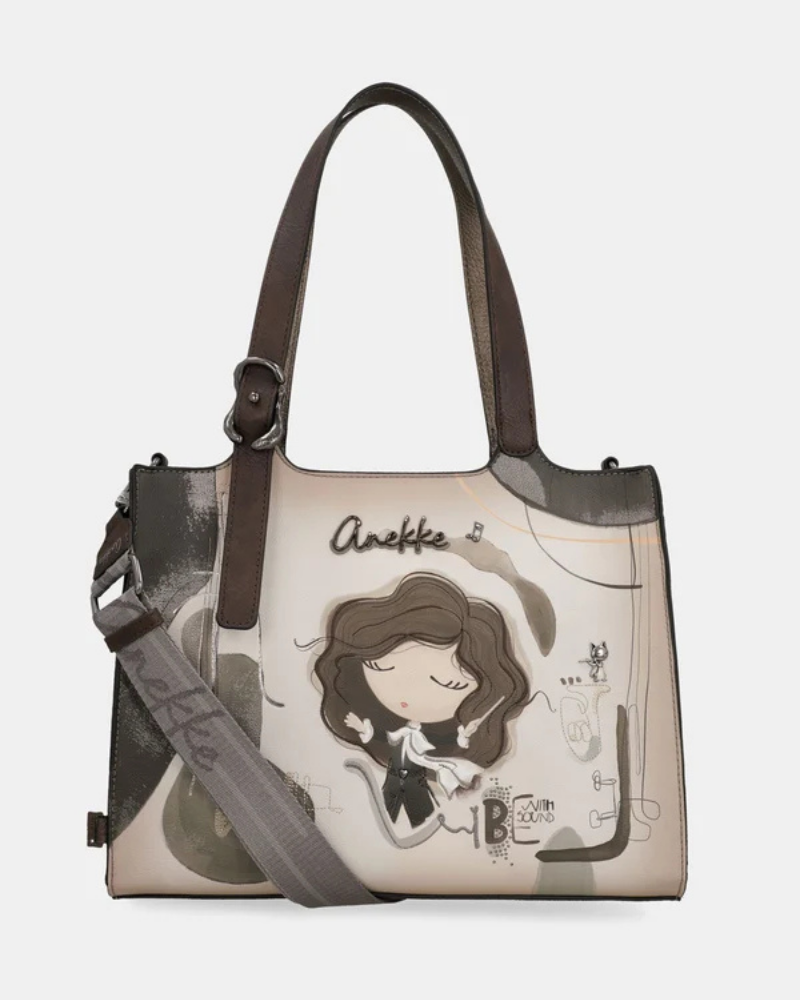 Elegante, expressiva e cheia de carácter, esta carteira da coleção&nbsp;Orchestra&nbsp;é o acessório perfeito para quem quer destacar-se com subtileza.

O seu painel frontal ilustrado, com a personagem Anekke numa cena intimista a tocar violoncelo, evoca sensibilidade artística e um gosto apurado pelo detalhe.