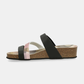 Fabricado com materiais de qualidade, este chinelo da Anekke combina o melhor do design contemporâneo com o conforto de um dia inteiro.

As tiras em preto contrastam com a palmilha em estampa camuflada multicor — um detalhe inesperado que transforma um básico de verão numa peça com carácter. A sola em cortiça proporciona amortecimento natural e leveza, enquanto a fivela dourada ajustável garante um ajuste perfeito ao pé.